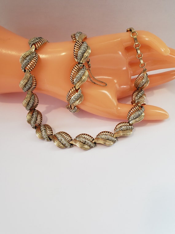 Jomaz gold tone and - Gem
