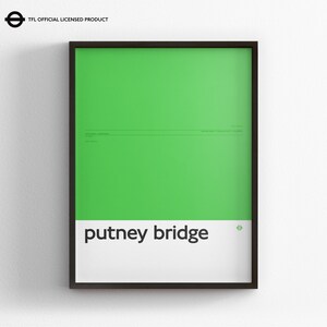 May include: A framed rectangular wall print featuring a bright green background with a white horizontal band at the bottom containing the black text 'putney bridge' and a small green roundel logo. The top left corner displays 'TFL OFFICIAL LICENSED PRODUCT'.