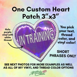 May include: A heart-shaped patch measuring 3 inches by 3 inches, featuring purple holographic vinyl with white embroidered text that reads IN TRAINING. The patch has a white stitched border. Text on the image includes customization details.