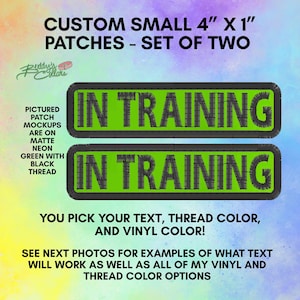 May include: A set of two rectangular patches measuring 10.16 cm by 2.54 cm, featuring a matte neon green background with black embroidered text that reads IN TRAINING. The patches have a black border and are displayed against a colourful background.