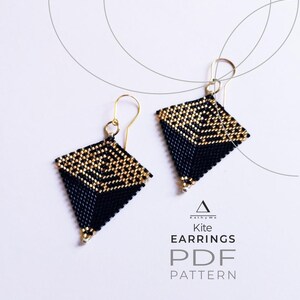 May include: A pair of kite-shaped earrings crafted from small black and gold beads, featuring gold-tone ear wires. The text Kathy Wo Kite EARRINGS PDF PATTERN is visible below the earrings, accompanied by a small triangle logo graphic.