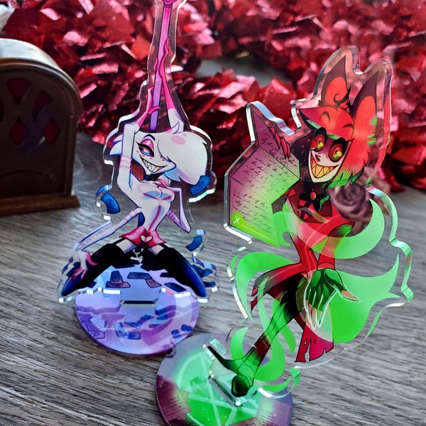 Angel Dust and Alastor Standees