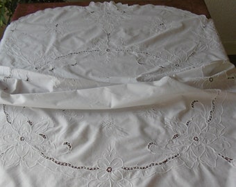 Very beautiful round tablecloth with various embroideries and