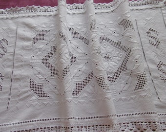 Huge and superb table runner surrounded by lace covered with embroidery