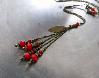 Necklace "etourdies" beads, red faceted glass.