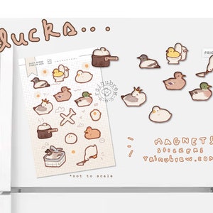 May include: A sheet of stickers featuring various illustrations of ducks in different activities, such as cooking, bathing, and relaxing. The stickers are designed in a cute, cartoon style with pastel colors. The sheet also includes the text "ducks..." and "rainubrew.com".