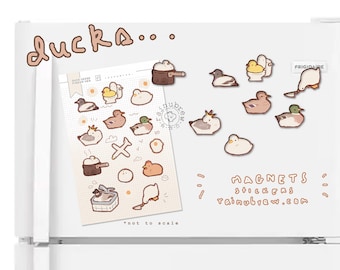 May include: A sheet of stickers featuring various illustrations of ducks in different activities, such as cooking, bathing, and relaxing. The stickers are designed in a cute, cartoon style with pastel colors. The sheet also includes the text "ducks..." and "rainubrew.com".