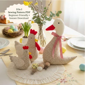 May include: A table setting featuring three fabric chicken and duck decorations with red accents. The duck has a red and white checkered ribbon. The text on the image says "3 in 1 Sewing Pattern PDF Beginner Friendly • Instant Download". Easter theme.