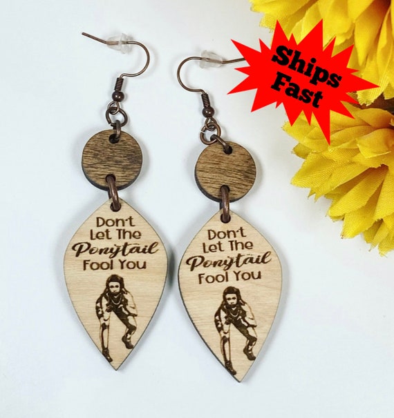 Empowering female wrestler earrings - female grappler - don’t let the ponytail fool you