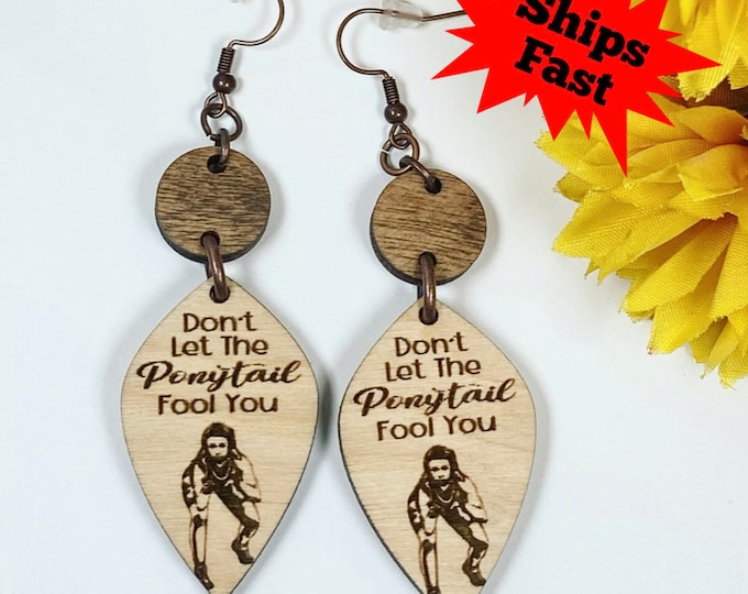 Empowering female wrestler earrings - female grappler - don’t let the ponytail fool you