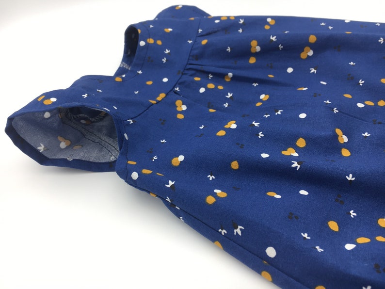 Printed cotton baby dress buttoned back