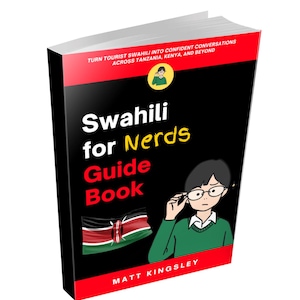 May include: A paperback book titled "Swahili for Nerds Guide Book" with a black cover and red accents. The cover features the Kenyan flag, a cartoon illustration, and the author's name, Matt Kingsley. The book's subtitle reads, "Turn tourist Swahili into confident conversations across Tanzania, Kenya, and beyond."