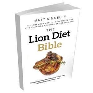 May include: A white book cover with the title "The Lion Diet Bible" in black and gold lettering. The book cover features a grilled pork chop with rosemary sprigs on a white background. The author's name, Matt Kingsley, is printed in black at the top of the cover. The subtitle reads "Reclaim Your Health: Experience the Life-Changing Benefits of the Lion Diet".