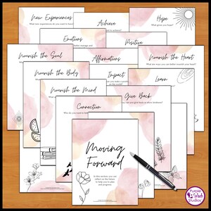 May include: A set of printable worksheets with watercolor backgrounds and black line drawings. The worksheets are designed to help with self-reflection and personal growth. The titles of the worksheets include "New Experiences", "Achieve", "Emotions", "Nourish the Soul", "Nourish the Body", "Nourish the Mind", "Connection", "Impact", "Give Back", "Learn", "Hope", "Positive", "Affirmations", and "Nourish the Heart".