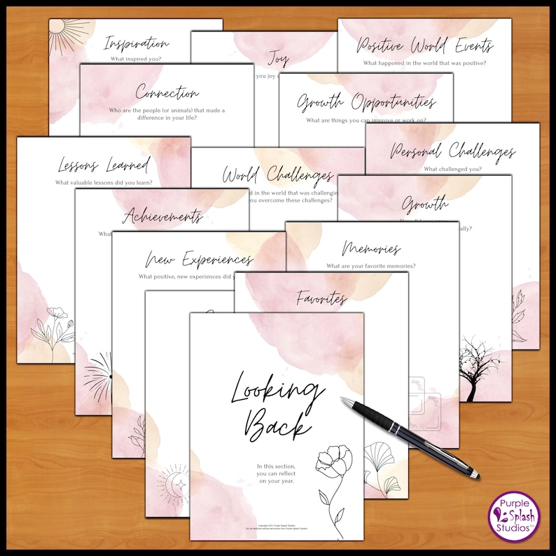 May include: A printable set of 12 journaling prompts with watercolor backgrounds and black line drawings. The prompts are designed to help you reflect on the past year and include topics like inspiration, connection, lessons learned, achievements, new experiences, world challenges, personal challenges, growth, memories, favorites, joy, and positive world events.