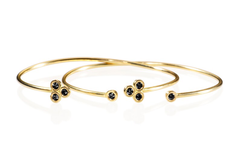 gold bracelet with stones