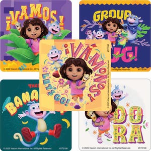 May include: A set of 4 Dora the Explorer stickers featuring Dora and Boots. The stickers have a colorful background with the text "Vamos", "Group Hug", "Let's Go!" and "Dora".