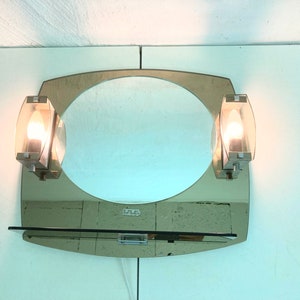 Illuminated mirror with shelf from Italy from the 1960s