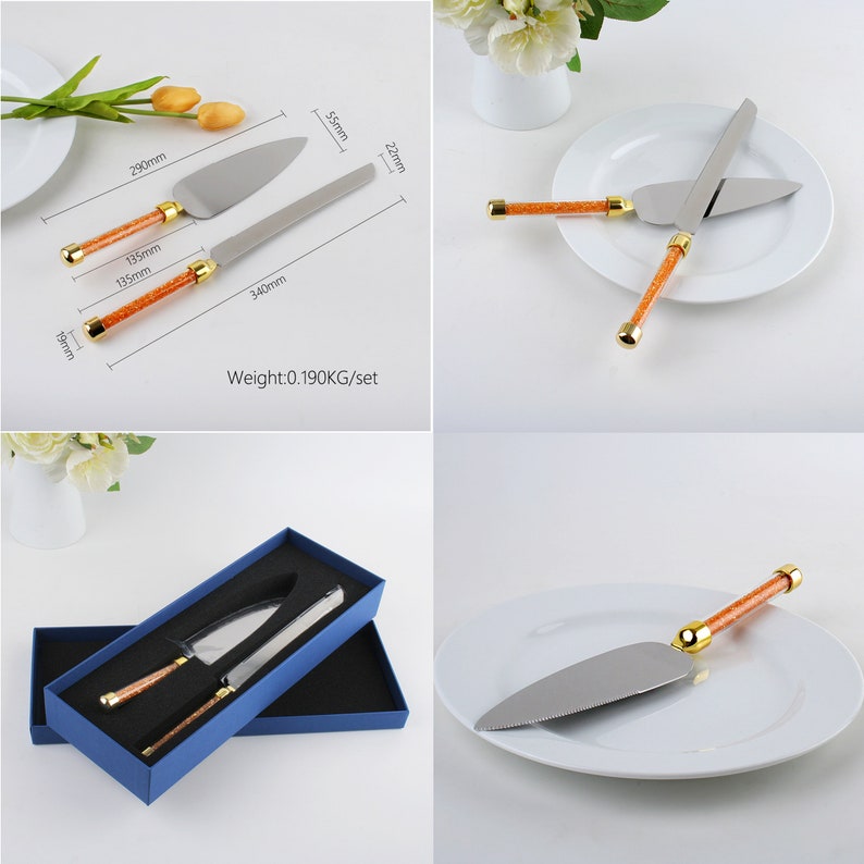 May include: A set of two cake servers with orange and gold handles. The servers are in a blue box and on a white plate. The servers are 13.5 inches long and 5.5 inches wide. The set weighs 0.190 kg.