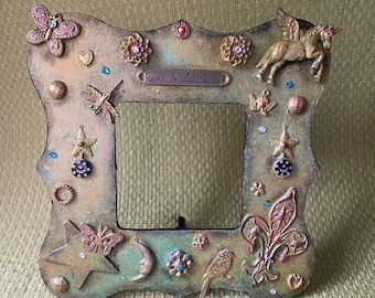 Imagine ..  Mixed media collage on wooden frame