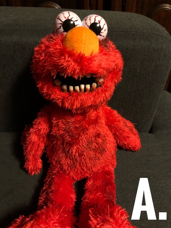 scary elmo doll