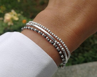 Set of three 925 silver bracelets with black beads