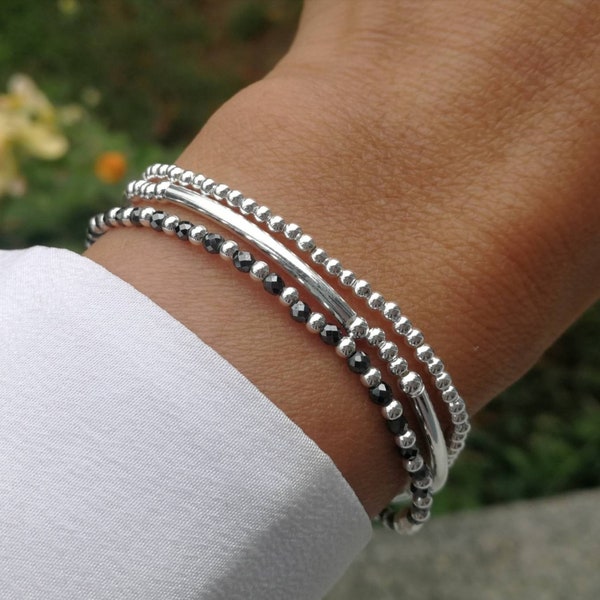 Set of three 925 silver bracelets with black beads