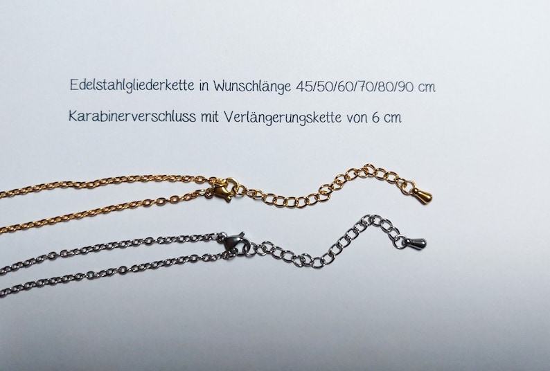 May include: Two stainless steel chains with lobster claw clasps. The gold chain is 45/50/60/70/80/90 cm long and the silver chain is 45/50/60/70/80/90 cm long. Both chains have an extension chain of 6 cm.