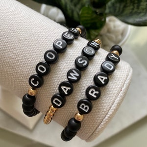 Personalized beaded bracelets. Beaded bracelets. Stacking bracelets. Beaded stacking bracelets. Name bracelets.