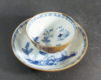 Nanking Cargo Cup and Saucer, Christies Nanking Cargo Sale Amsterdam 1986, Batavia Brown with Blue and White Landscapes, ca 1750