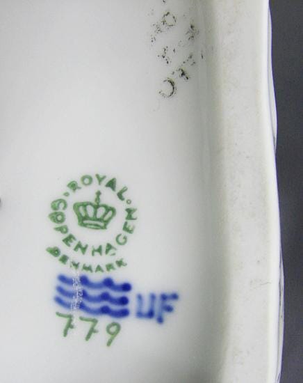Royal Copenhagen Woman Feeding Cow, Porcelain, #779, Designed by