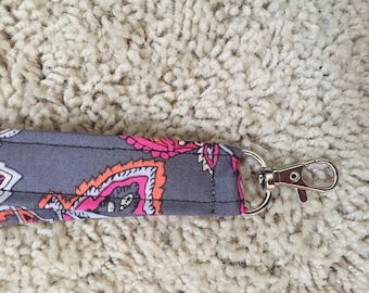 Pink, gray and purple flowered lanyard
