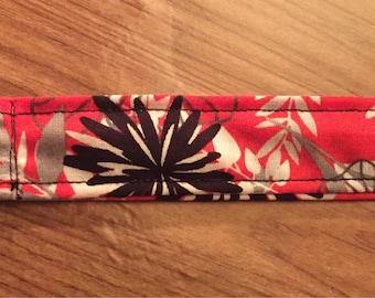 Coral, black, gray, and white lanyard