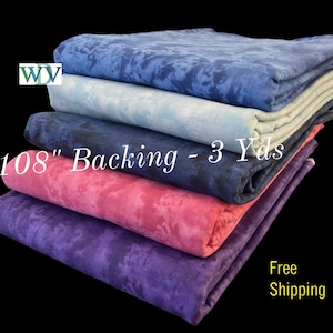 May include: A stack of five fabric backing pieces in various shades of blue, pink, and purple. Each piece is 108 inches wide and 3 yards long. The text "108" Backing - 3 Yds" is visible on the fabric.