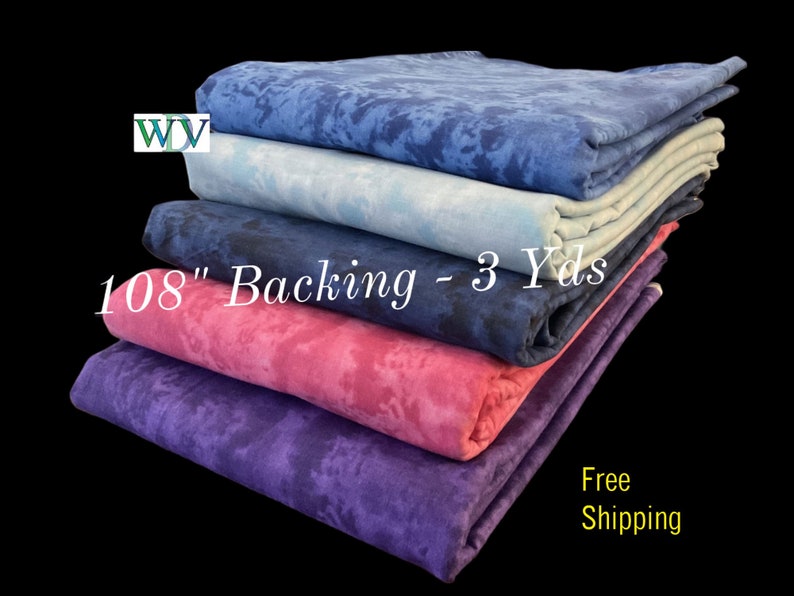 May include: A stack of five fabric backing pieces in various shades of blue, pink, and purple. Each piece is 108 inches wide and 3 yards long. The text "108" Backing - 3 Yds" is visible on the fabric.