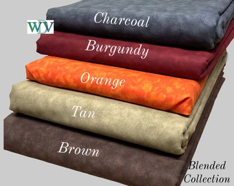 May include: A stack of five fabric swatches in different colors: charcoal, burgundy, orange, tan, and brown. The fabric is a blended collection.