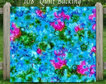 May include: A fabric quilt backing featuring a vibrant pattern of swirling blue, green, and magenta floral motifs. The text 3 Yards 108" Quilt Backing is printed at the top. The design consists of interconnected, abstract flower shapes.