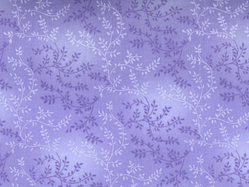 May include: A purple fabric with a white floral pattern. The fabric has a subtle gradient effect, with the purple color being lighter in the center and darker towards the edges.