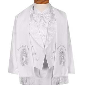 May include: White suit with a white embroidered vest and a white scarf with silver embroidery of the Virgin Mary. The scarf has silver fringe.