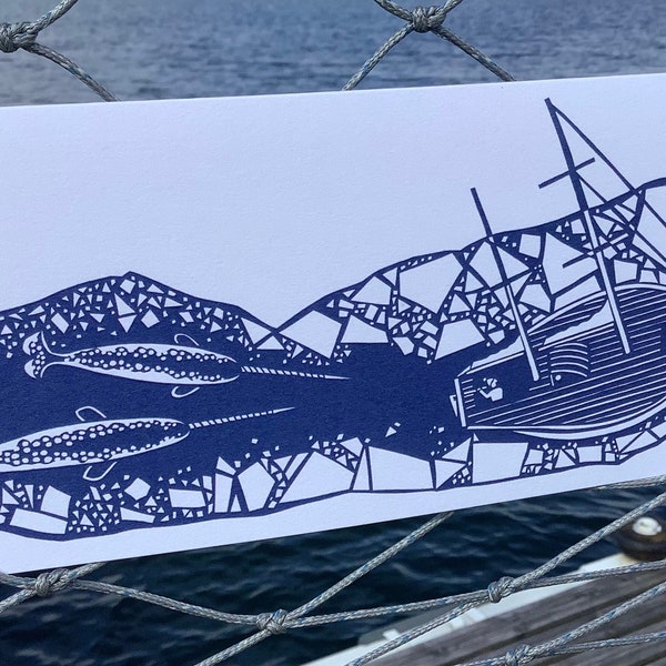 Blank card featuring a paper cut design of a ship in ice.