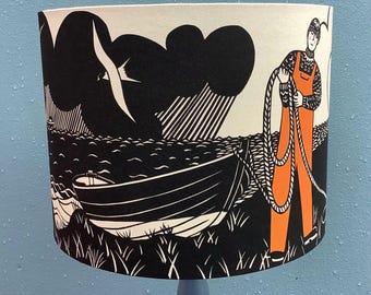 Lampshade, from an original paper cut design featuring a person in orange oilskins and a sixareen.