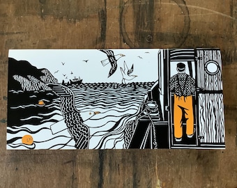 Blank card featuring paper cut design of a fisherperson in orange oilskins.