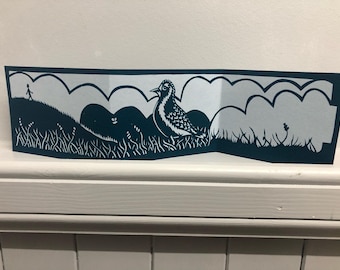 Hand screen printed concertina card. Taken from an original paper cut featuring a Plover and a walker.