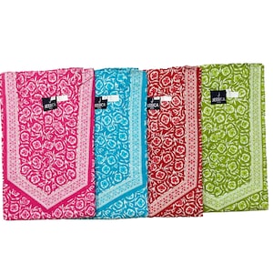 May include: Four colorful floral print dresses in pink, turquoise, red, and green. Each dress features a white floral pattern and a white border. The dresses have a tag that reads "JESSICA".