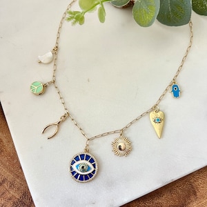 Evil eye charm necklace / spiritual necklace / charm jewelry / peace necklace / heart necklace / moon charm necklace / mismatched necklace
