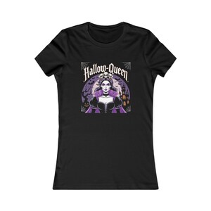 May include: Black t-shirt with a Halloween-themed graphic. The design features a woman with a skull crown, a purple cape, and the text "Hallow-Queen". Includes a spooky castle, bats, and spiderwebs.