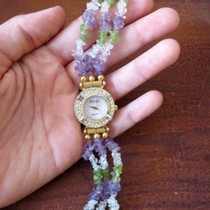 Vintage Prestige Ladies Quartz Watch with Green, Purple, and Clear Glass Cut Stones, Gold Toned Metal, Rhinestones, Not Working #301 71319