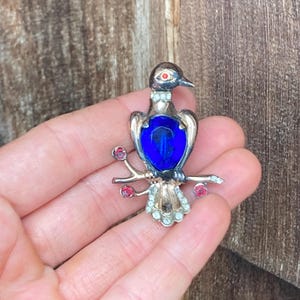 Vintage Reja Sterling Bird Brooch with Faceted Dark Blue Jelly Belly Center and Rhinestone Accents, Metal Wear #4498