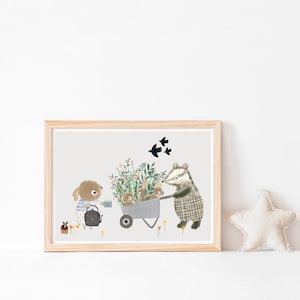 May include: A framed print featuring a whimsical illustration of woodland animals. A rabbit waters flowers, while a badger pushes a wheelbarrow filled with bunnies and greenery. Three black birds fly above the scene. The artwork has a light, airy feel.