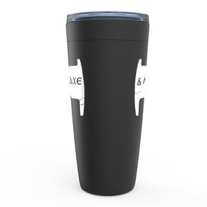 May include: Black travel mug with a white logo that says "& Axe" on one side and "Axe" on the other side.
